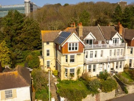 Coastal location : Partially converted three floor house into three flats 